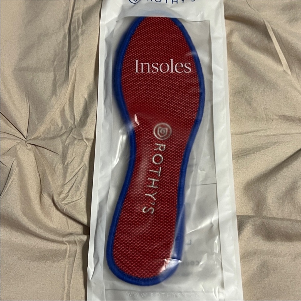 Rothy’s red insoles with blue trim